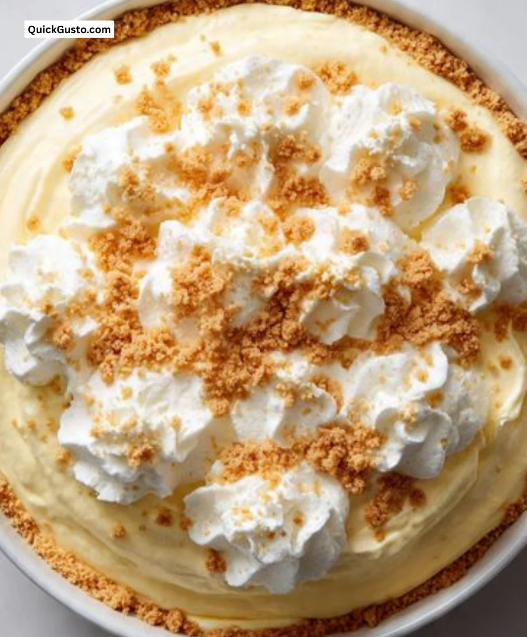 Delicious cheesecake fluff dessert in a bowl with a spoon
