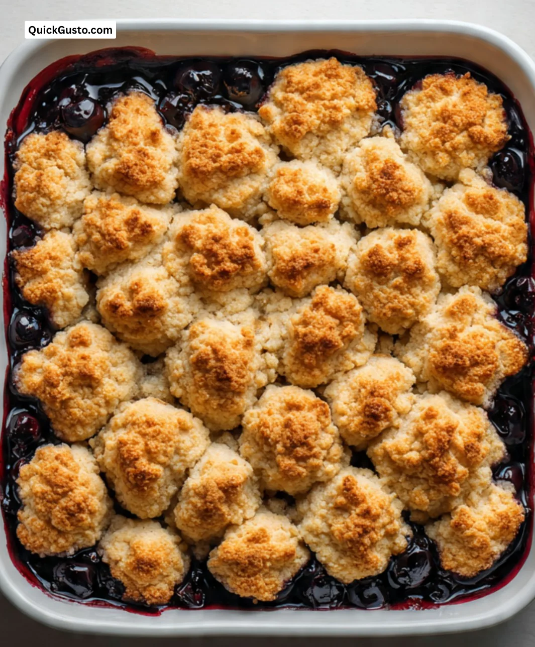 Freshly baked classic blueberry pie with a golden crust and juicy filling