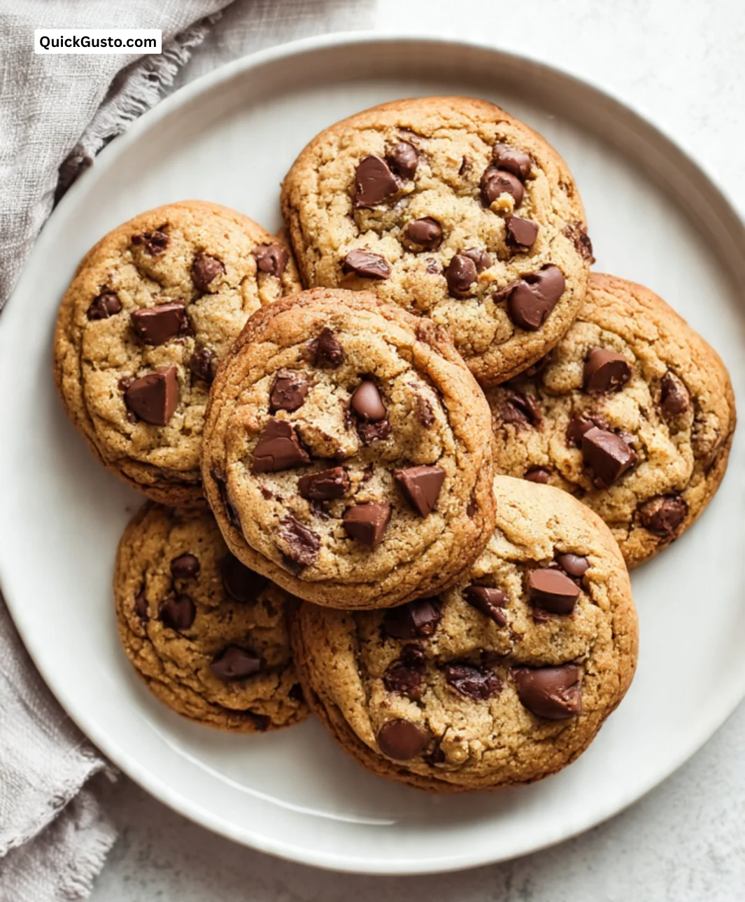 Freshly baked coffee chocolate chip cookies on a cooling rack