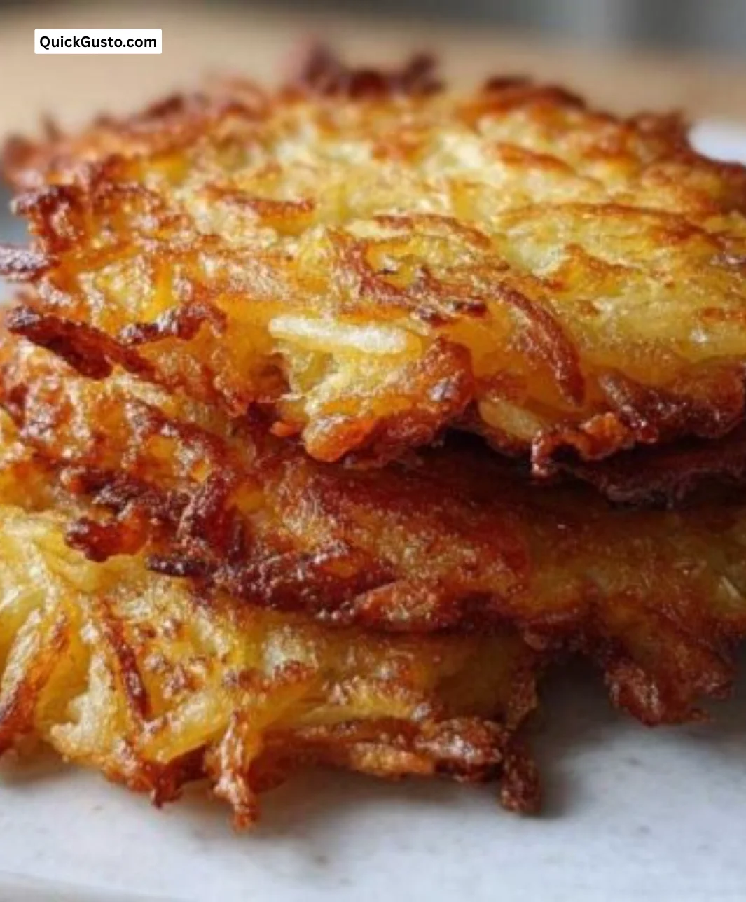 Crispy potato latkes served with applesauce and sour cream