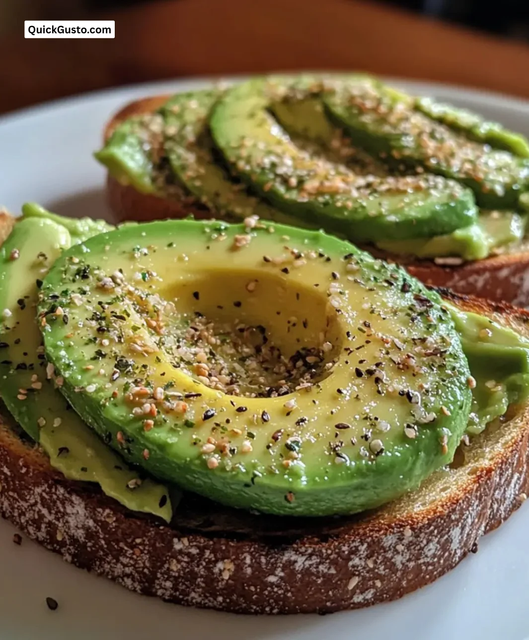 Easy quick avocado toast bites served on a plate with vibrant toppings.