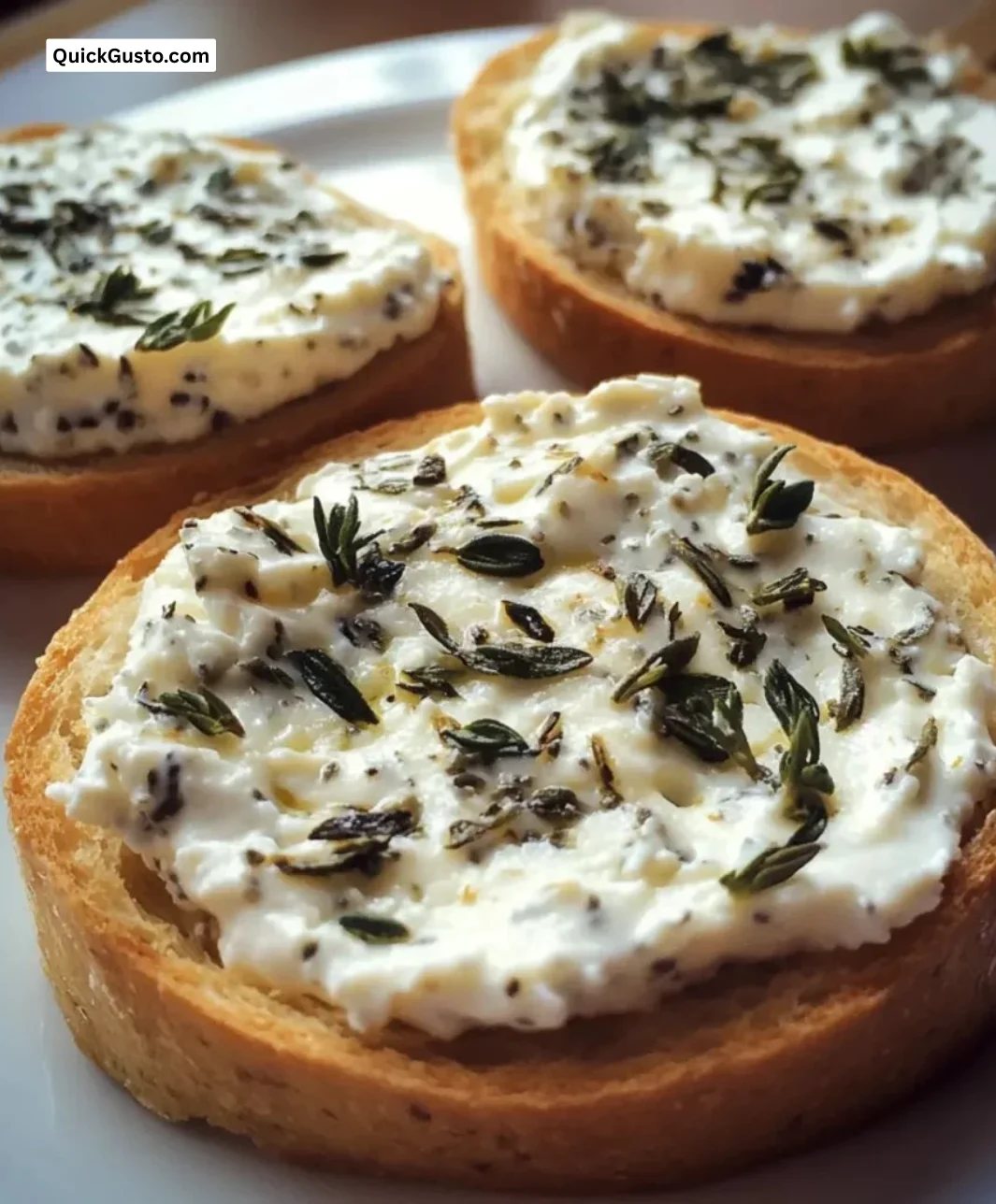 Savory cottage cheese herb snack served in a bowl with fresh herbs on top