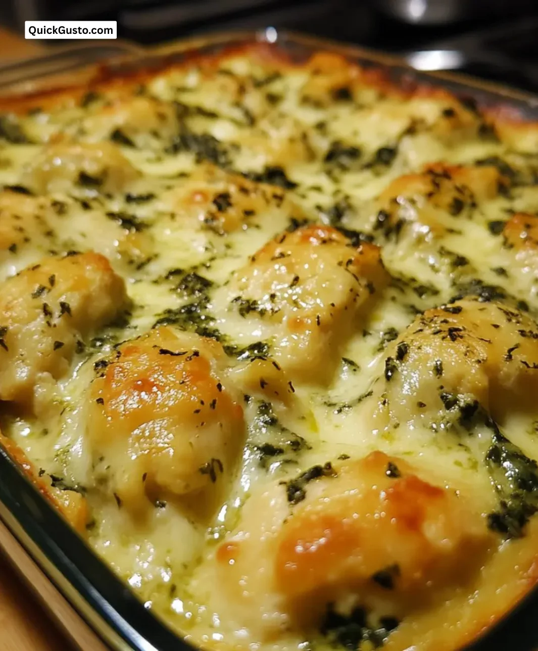 Delicious Spinach Cheese Baked Chicken Casserole served in a dish