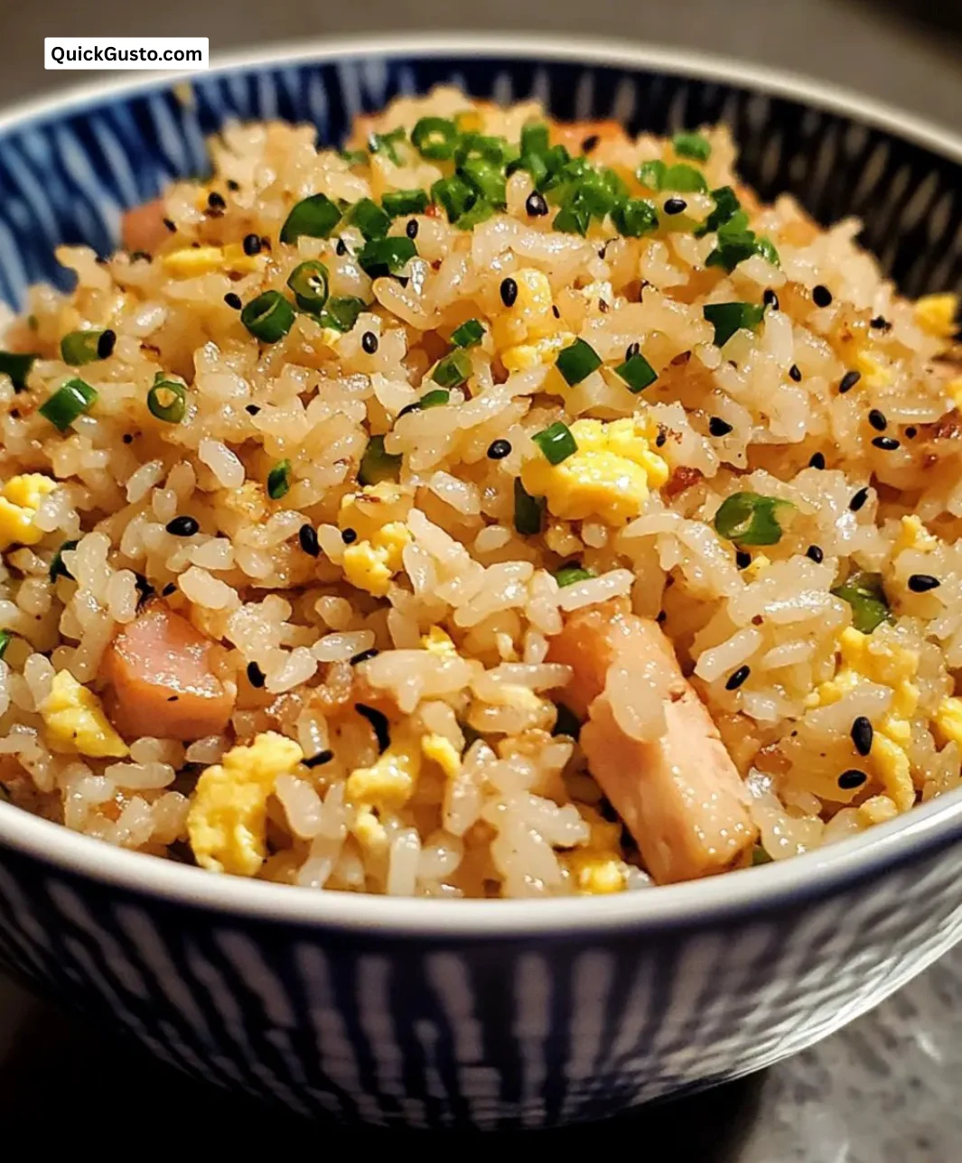 Delicious easy weeknight egg fried rice served in a bowl with vegetables.