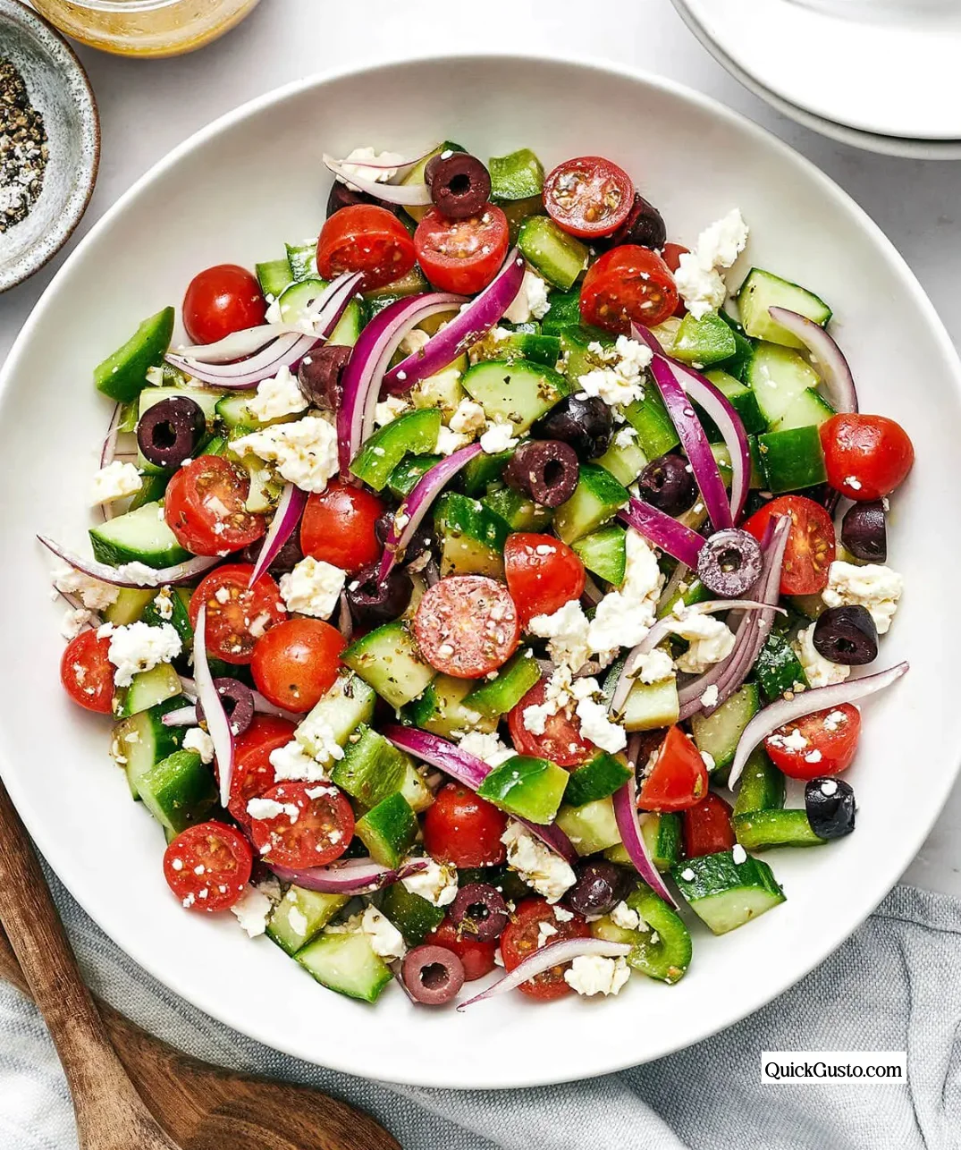 Delicious Greek Salad with tomatoes, cucumbers, feta cheese, and olives
