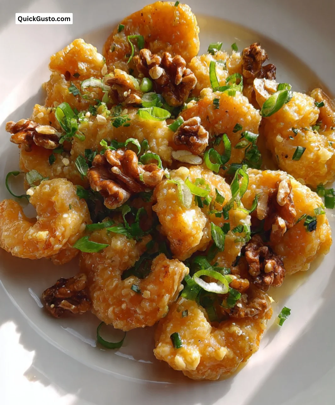Delicious Honey Walnut Shrimp served with crispy walnuts and creamy sauce.