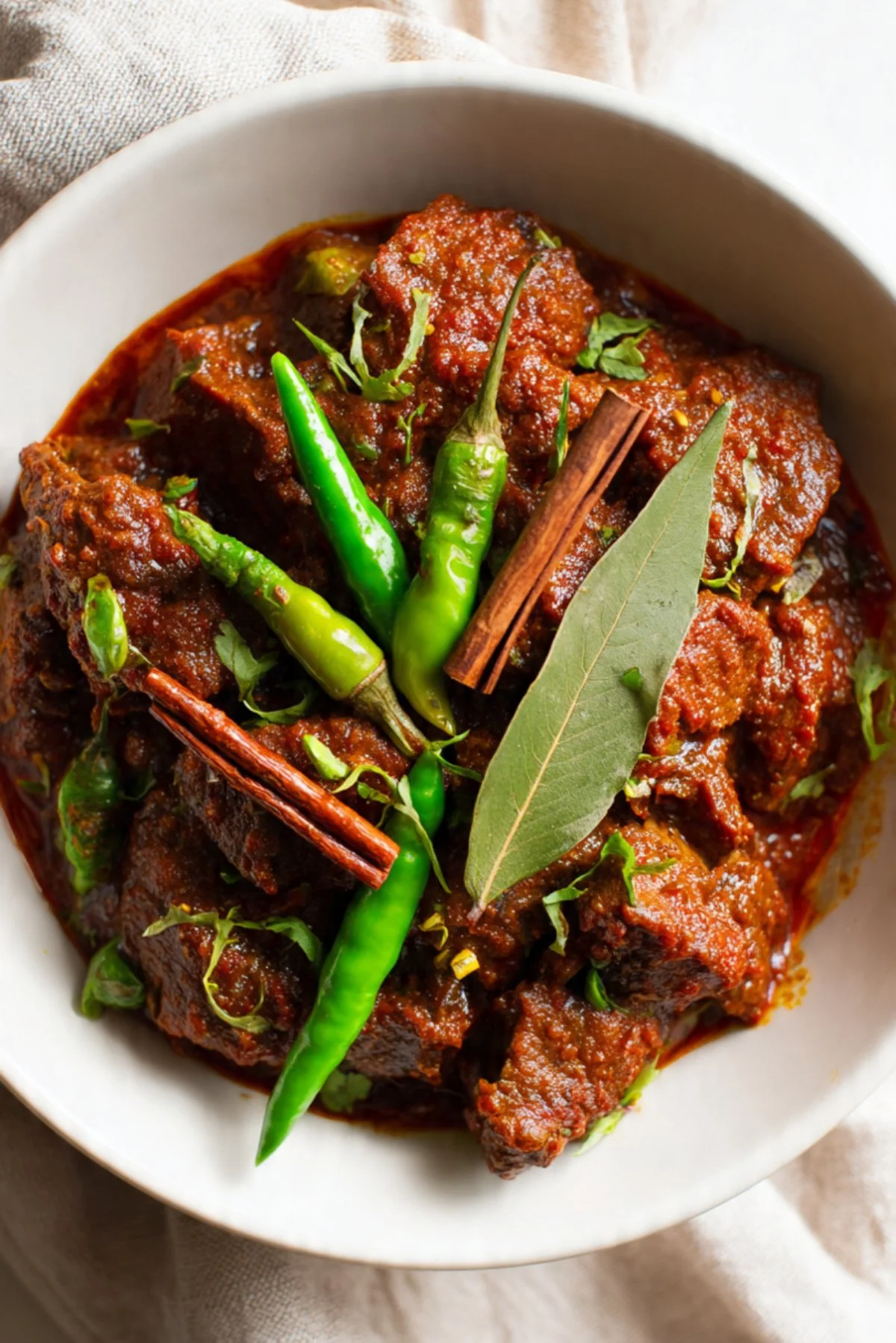 Delicious Lamb Bhuna served with aromatic spices and herbs.