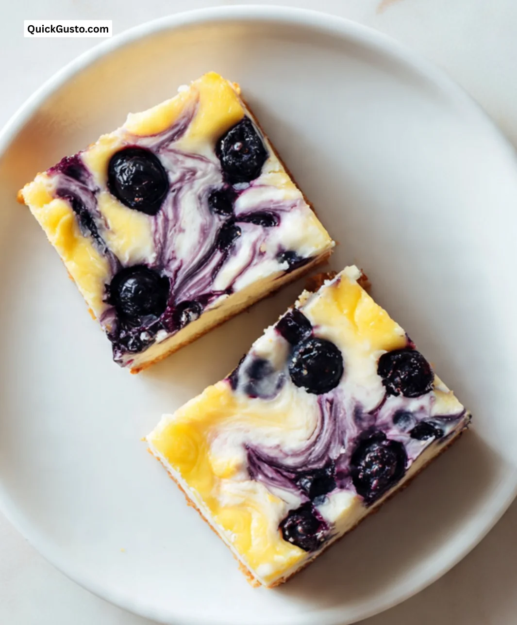 Lemon-Blueberry Cream Cheese Bars topped with fresh blueberries