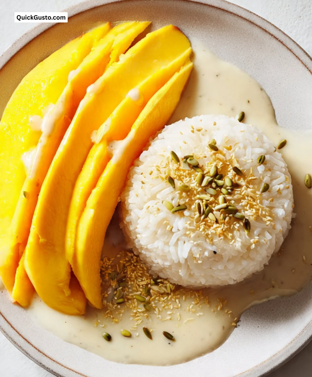 Delicious serving of Mango Sticky Rice with ripe mango slices and coconut sauce