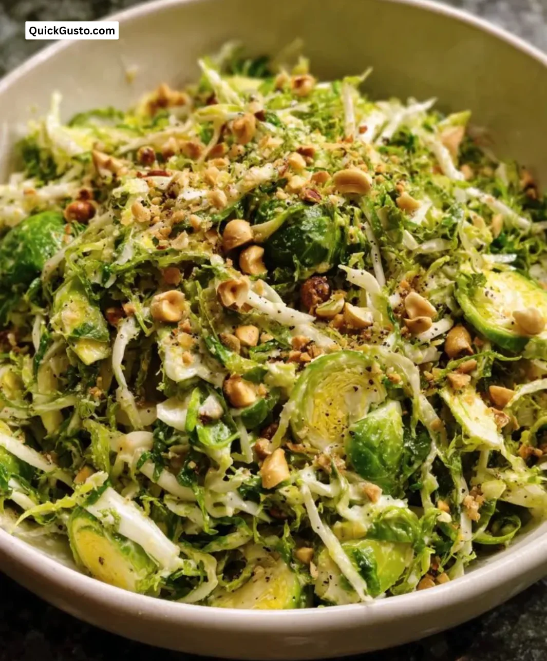 Shredded Brussels-Sprout Hazelnut Crunch dish garnished with nuts