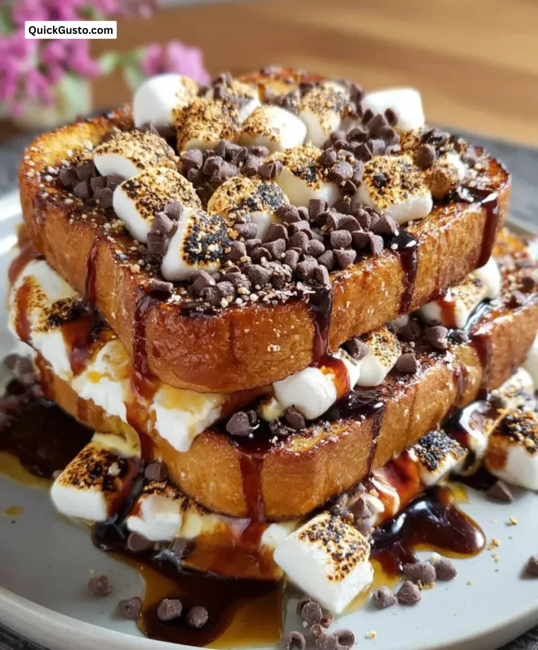 Delicious S'mores French Toast topped with marshmallows and chocolate