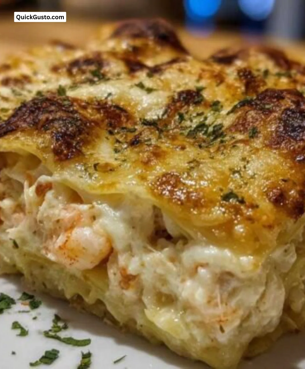 Delicious creamy shrimp and crab seafood lasagna served in a dish