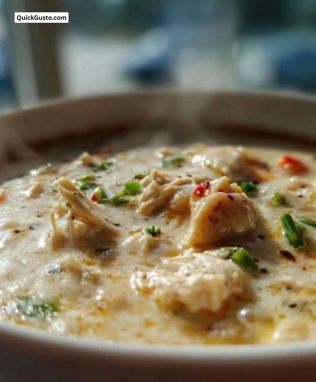 Creamy white chicken chili ready to serve in a bowl
