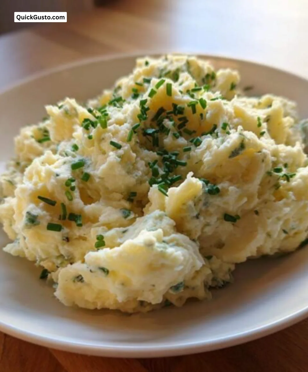 Boursin mashed potatoes served in a bowl, creamy and fluffy texture.