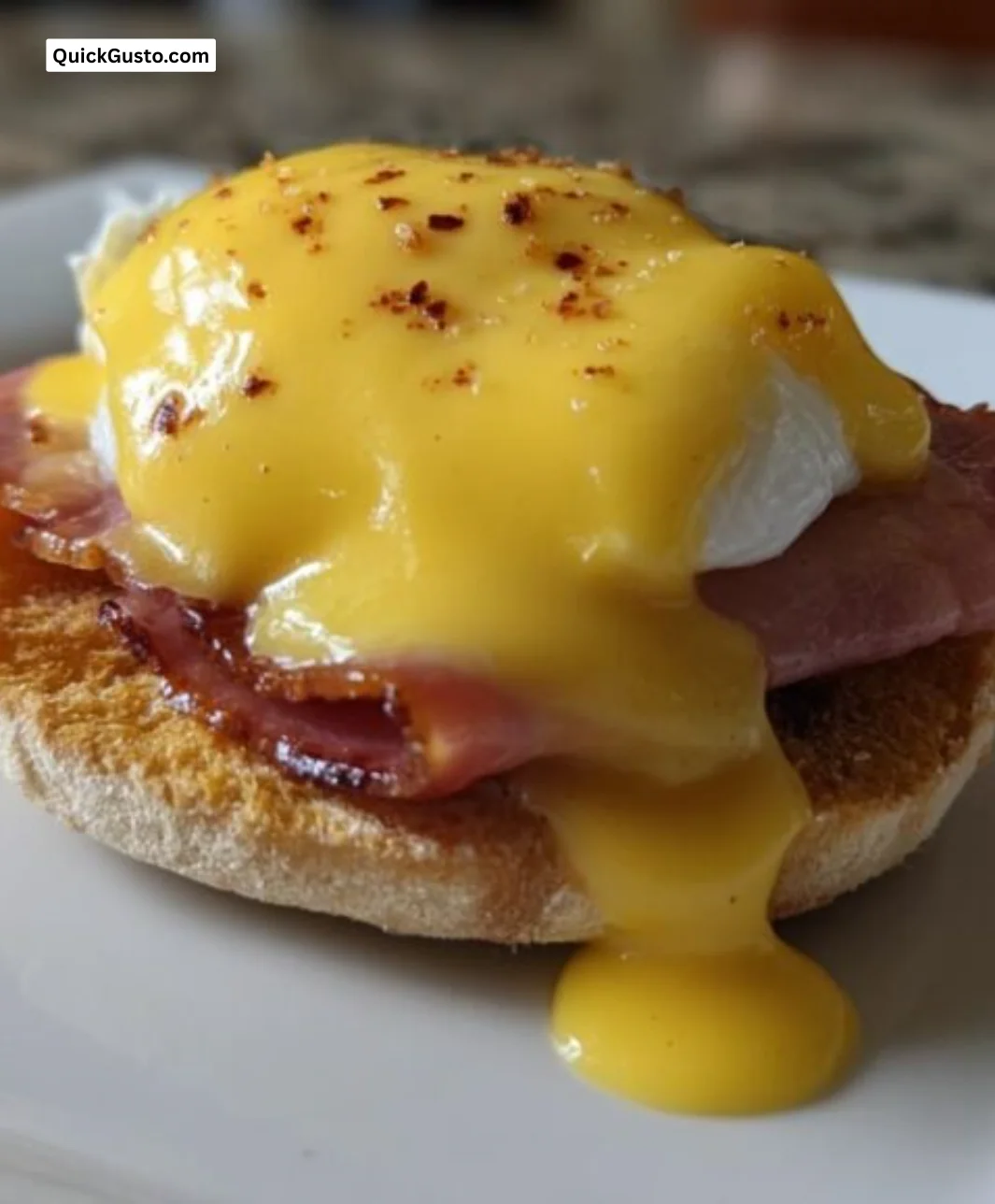 30-Minute Eggs Benedict dish with poached eggs, hollandaise sauce, and English muffin