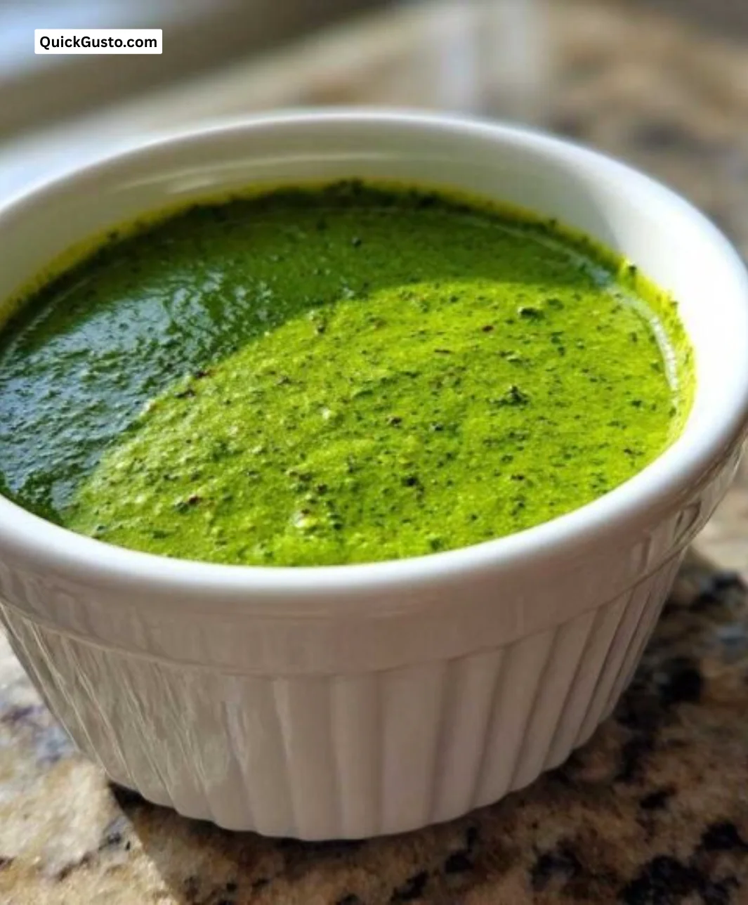 Fresh cilantro lime sauce in a small bowl, ready to enhance your dishes.