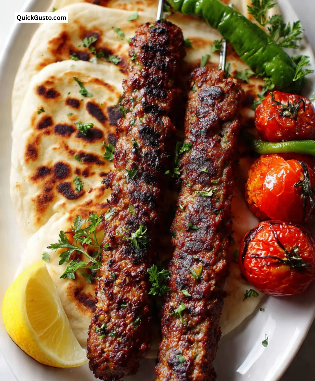 Delicious Adana Kebab served with fresh vegetables