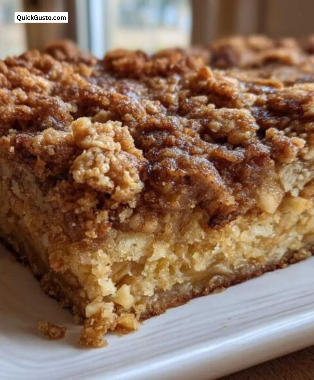 Baked oatmeal topped with fruits and nuts in a baking dish