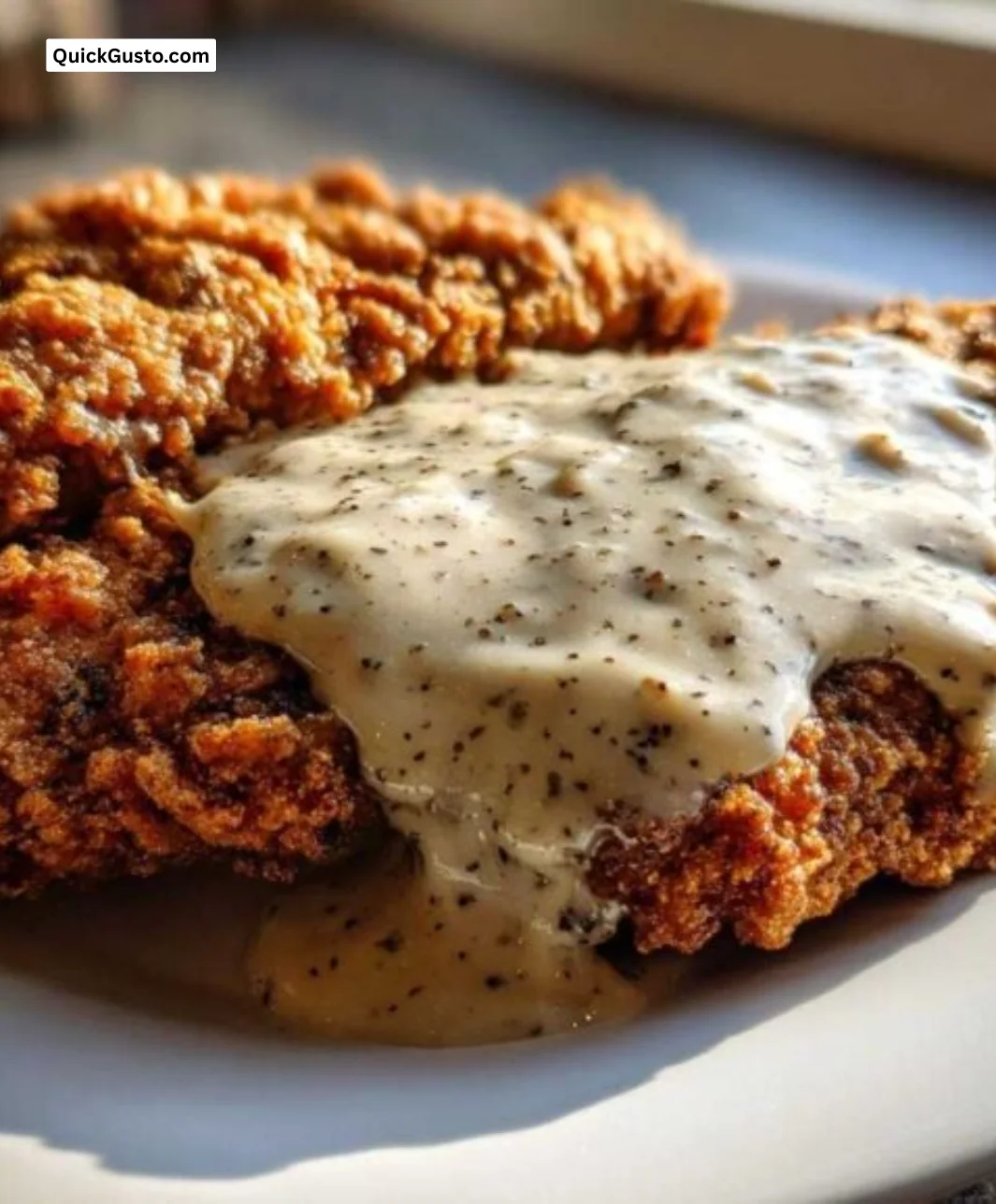 Delicious Chicken Fried Steak served with gravy, a classic comfort food dish.