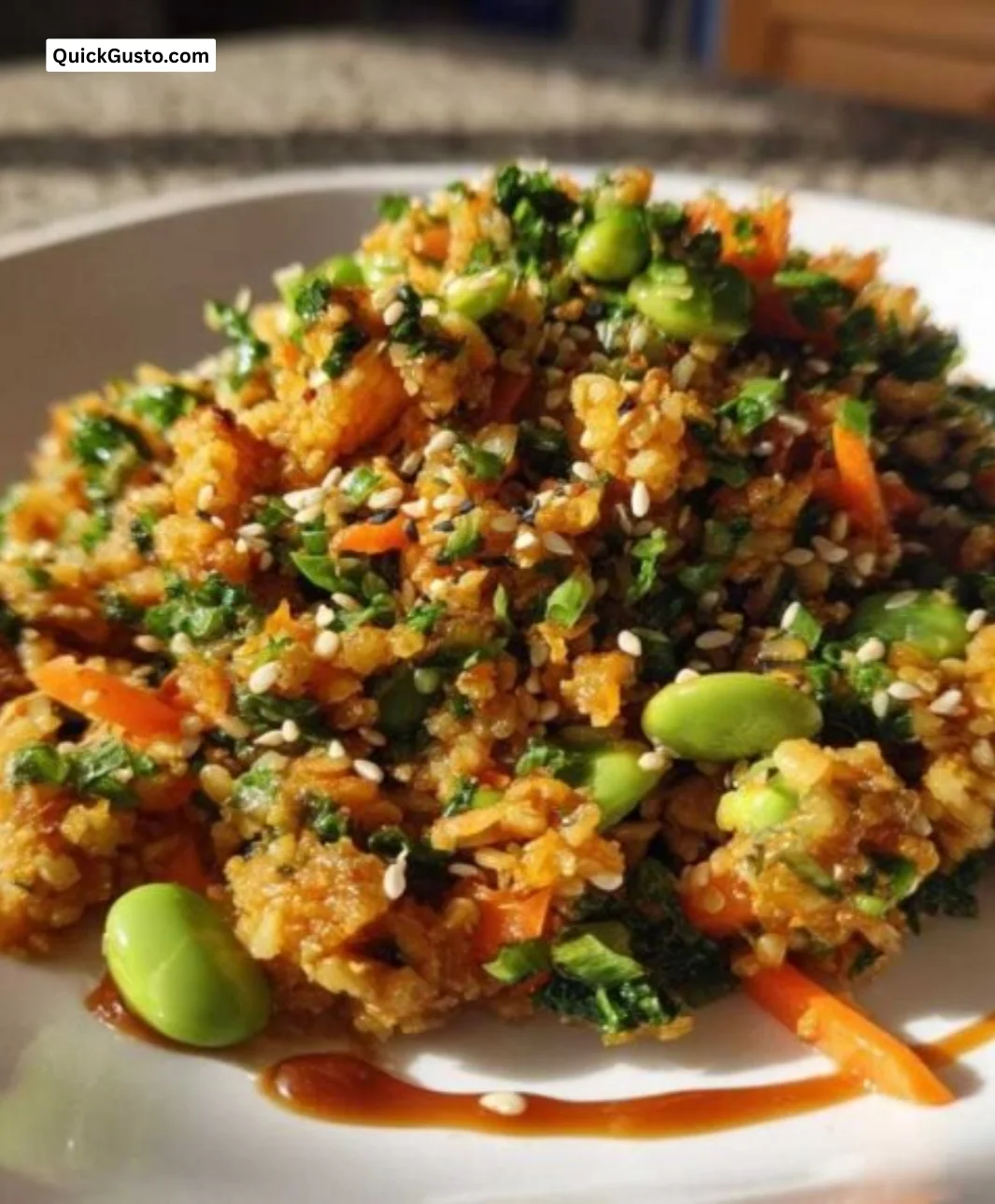A vibrant crispy rice salad with fresh vegetables and herbs.