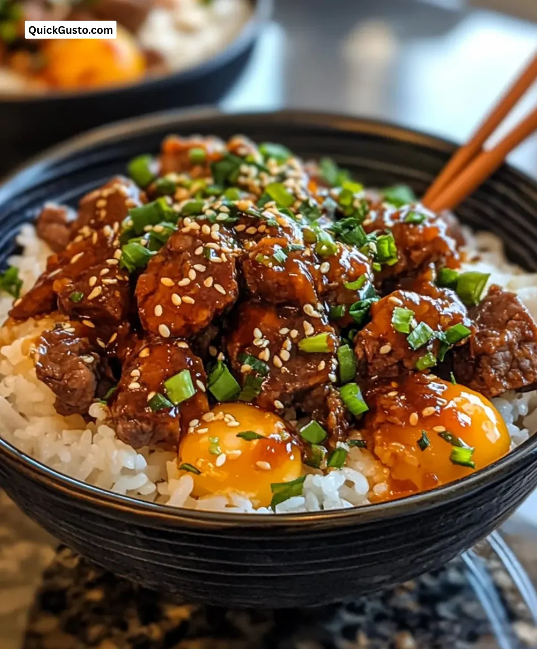 Delicious Gochujang Beef Rice Bowls served in a bowl with fresh vegetables