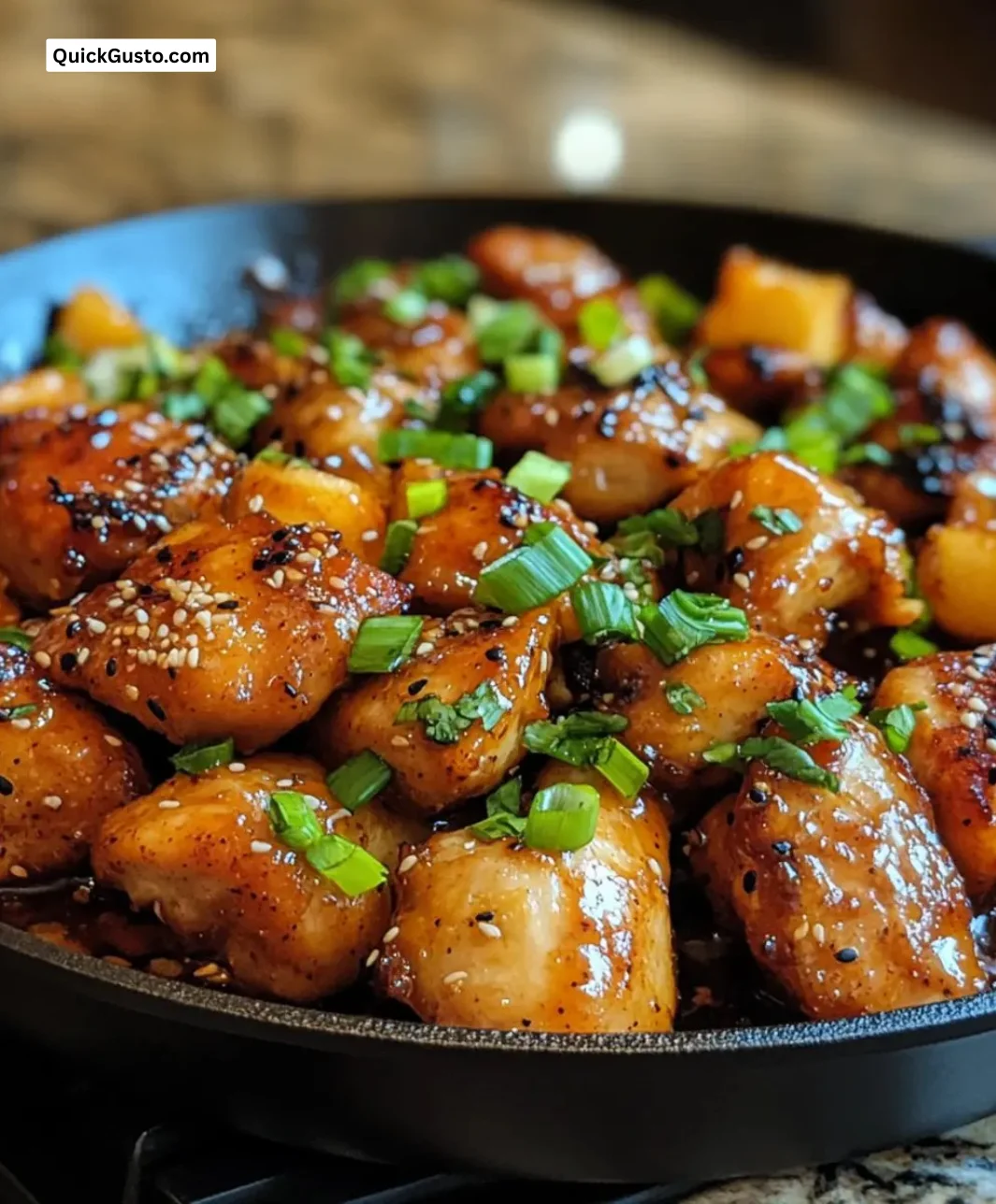Skillet dish of gochujang honey chicken thighs with colorful vegetables