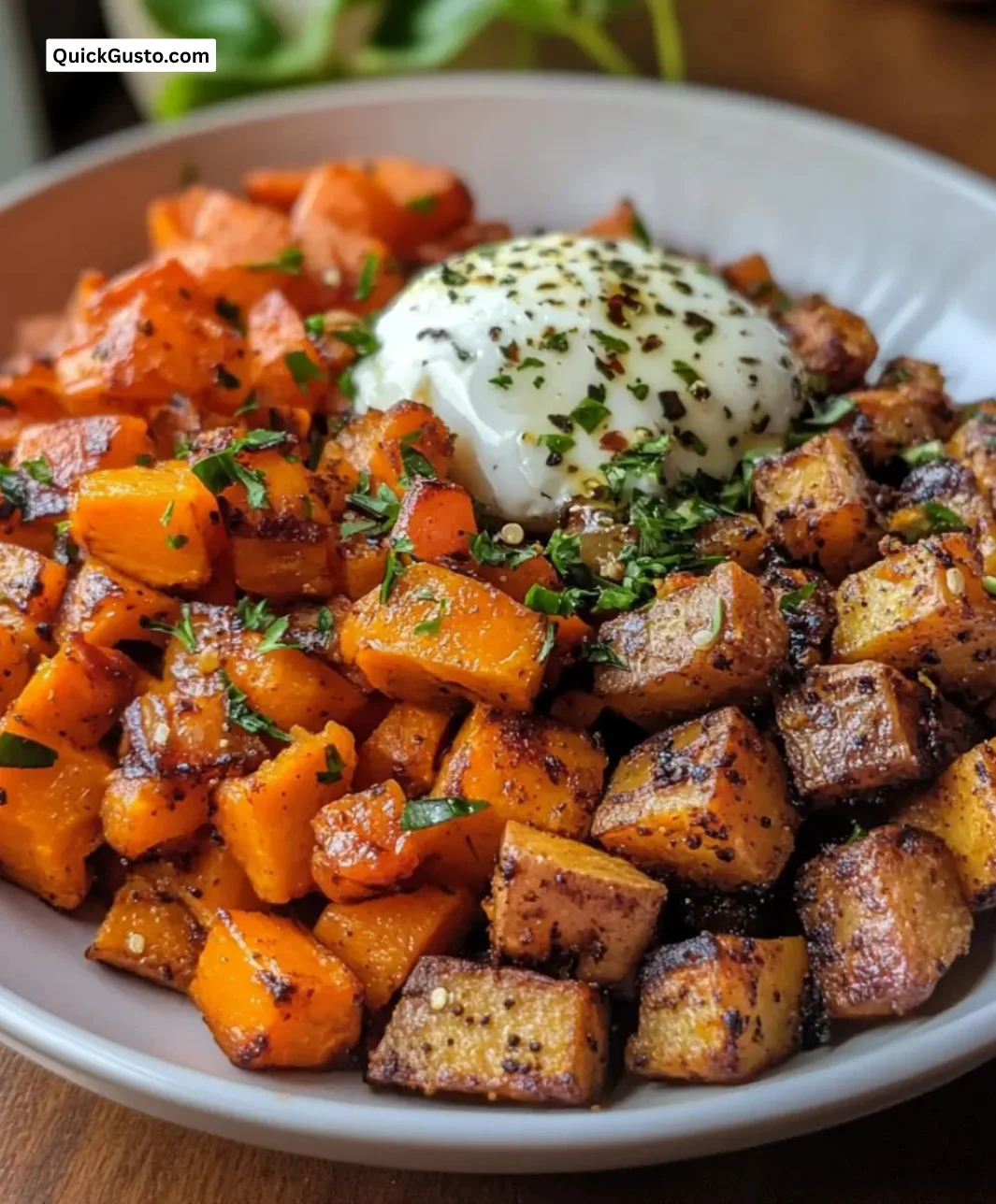 Easy gluten-free sweet potato hash served in a bowl with fresh herbs