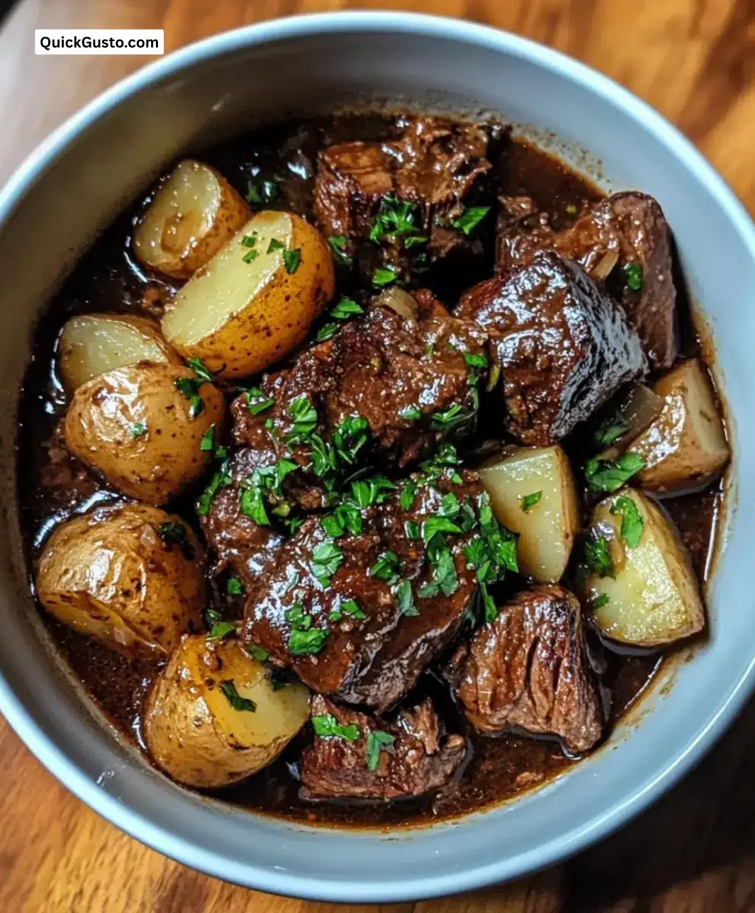 Delicious Easy Instant Pot Garlic Braised Beef with Potatoes served on a plate