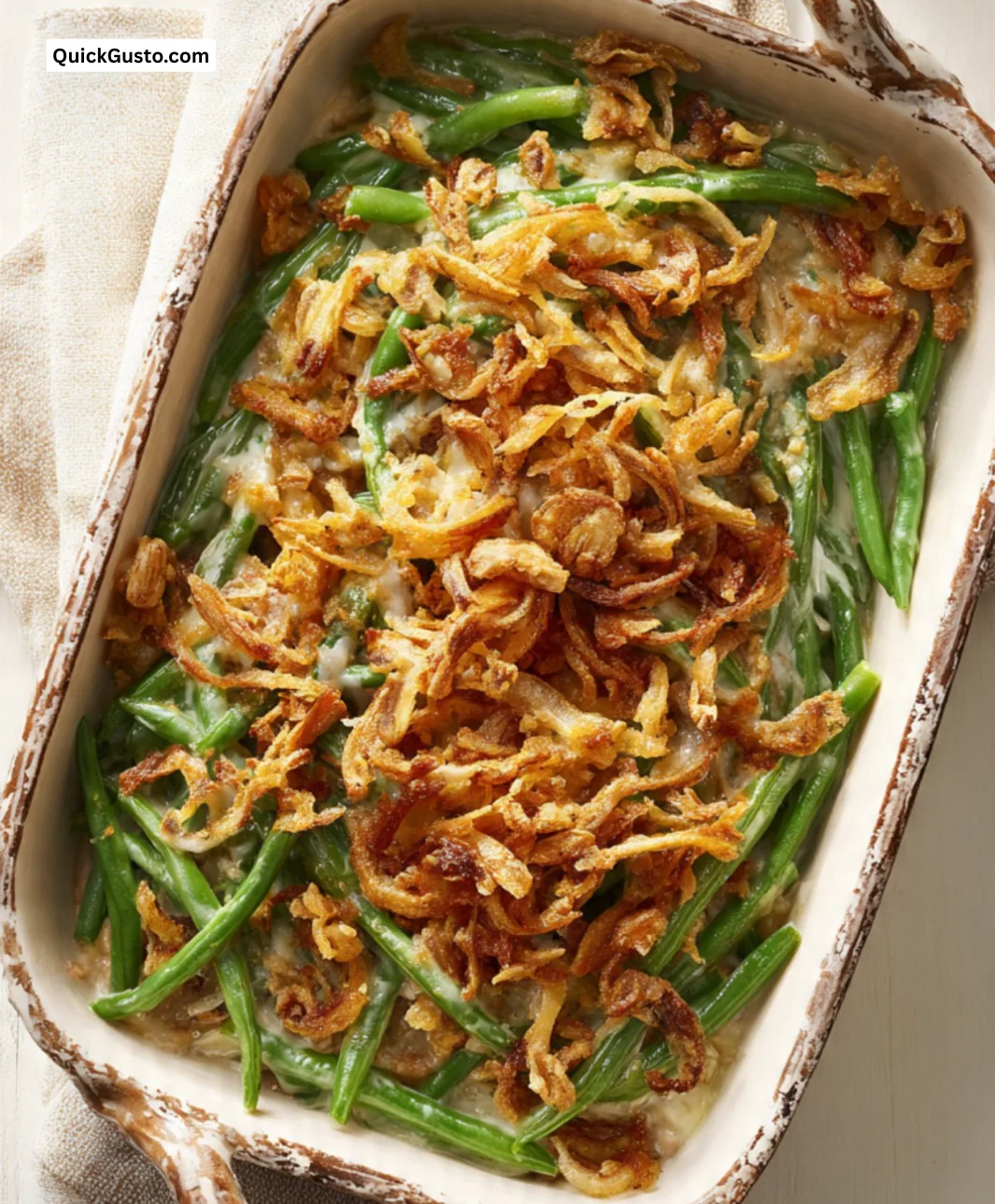 Delicious homemade Green Bean Casserole topped with crispy fried onions.