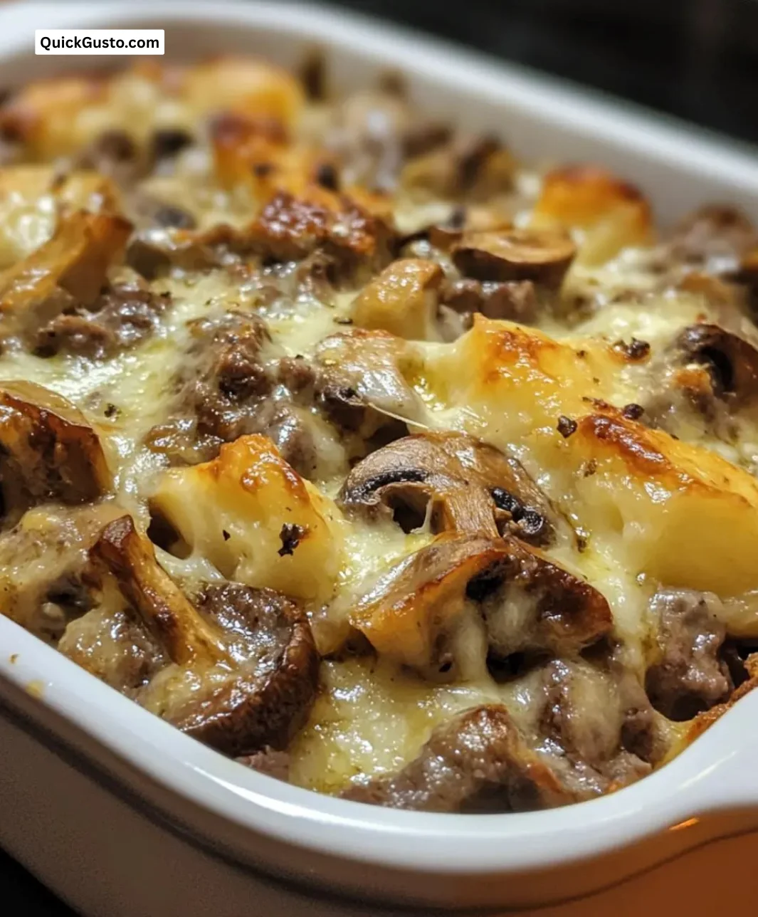 Savory beef and mushroom casserole served in a rustic dish