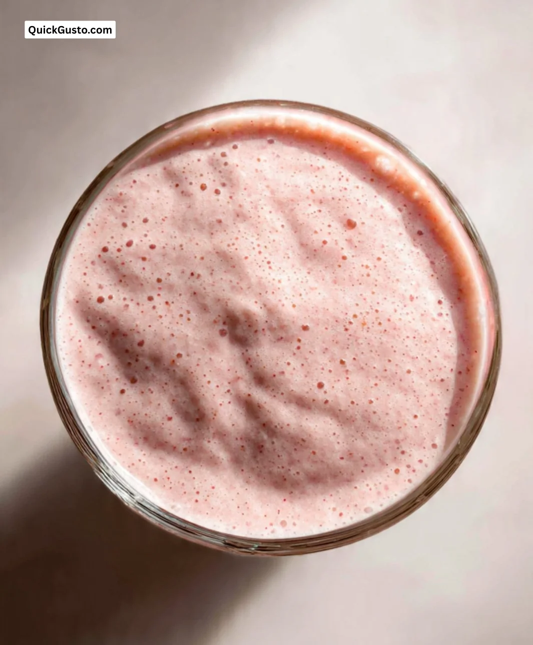 Delicious kefir breakfast smoothie topped with fresh fruits and granola