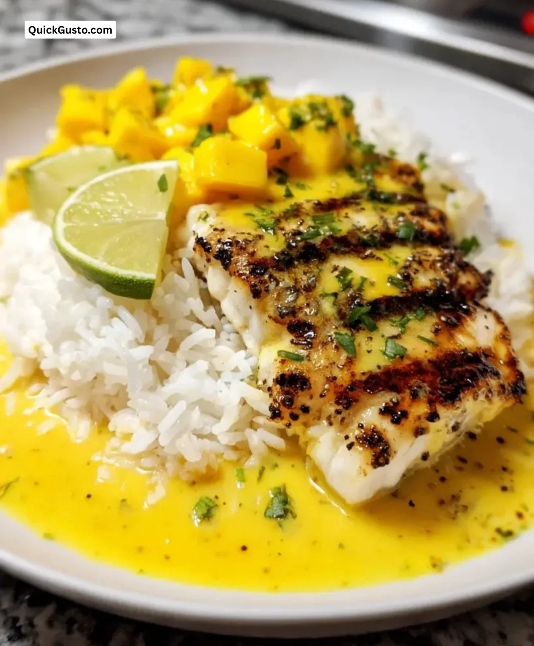 Mahi Mahi fillet topped with mango and lime butter sauce