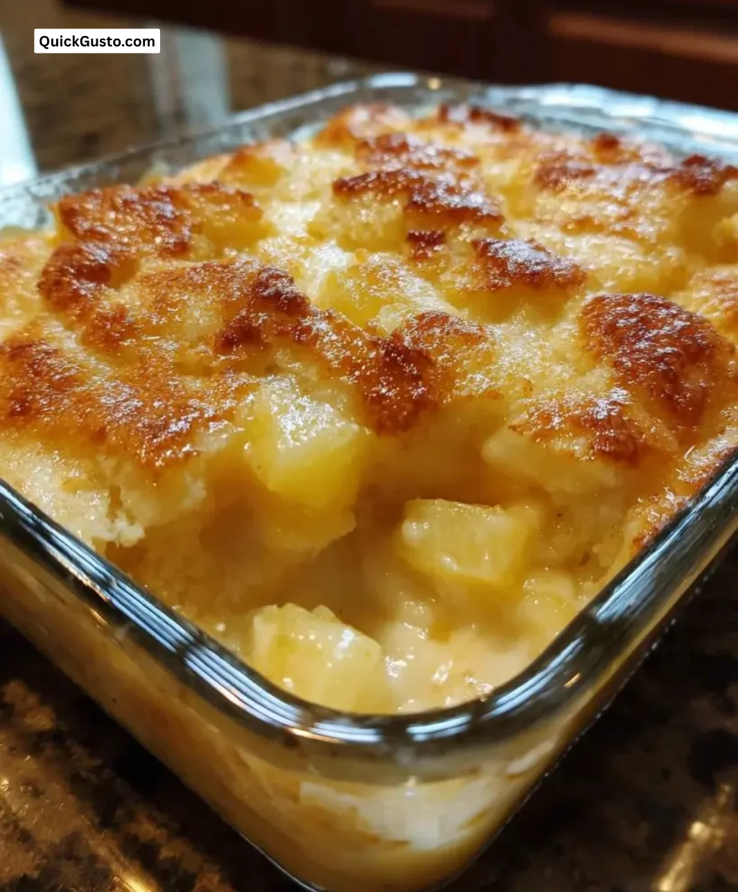 Delicious Pineapple Cream Cheese Cobbler with a golden crust and creamy filling.