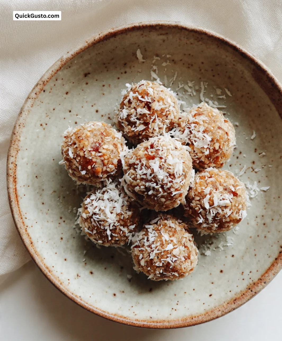 Delicious Sesame-Date Bites made with crystal dates and sesame seeds.