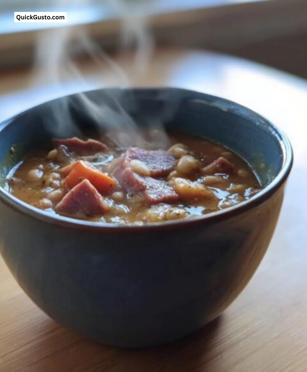 Bowl of Soulful Ham and Bean Soup with herbs and bread