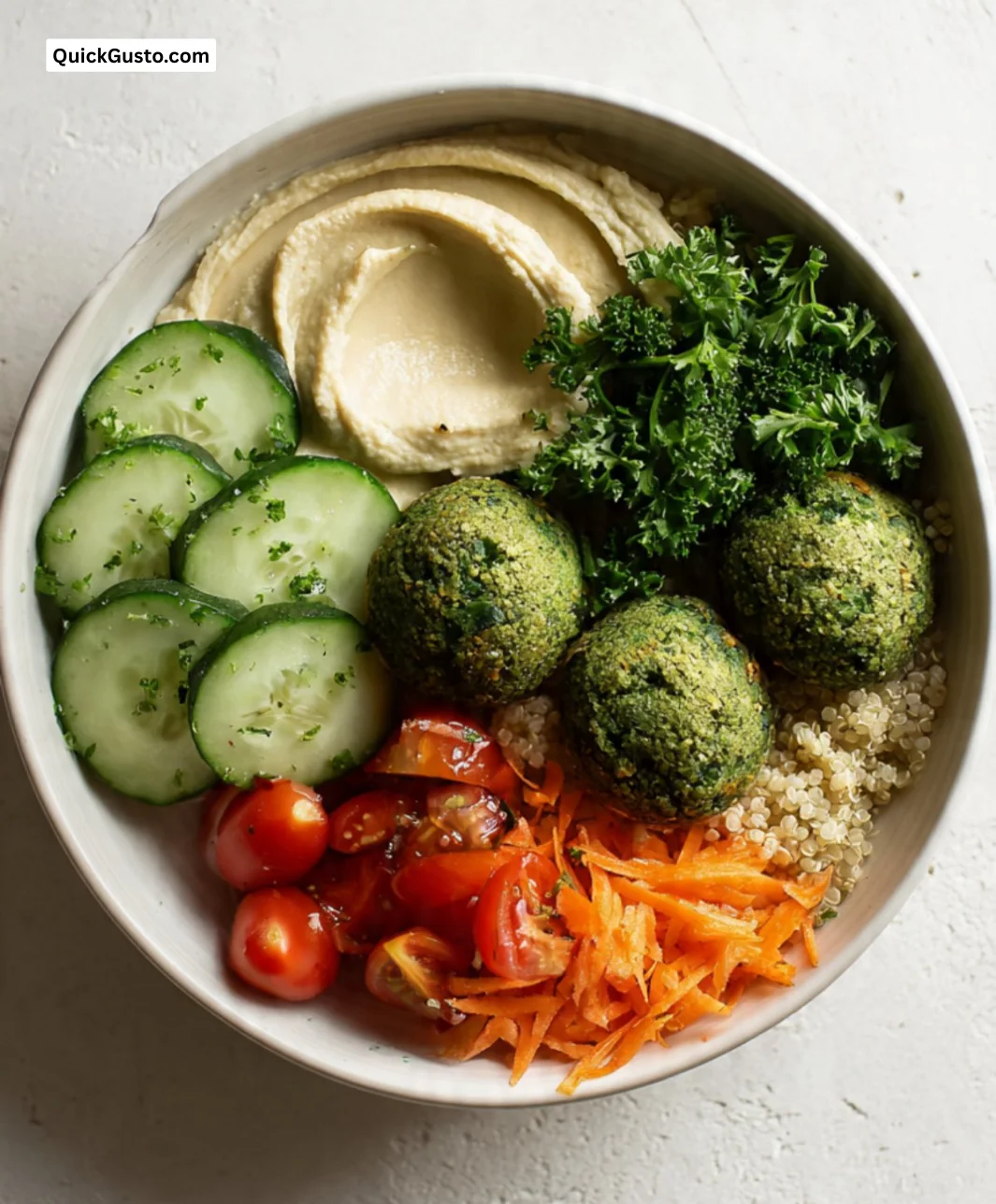 Spinach Falafel and Hummus Bowl with fresh ingredients