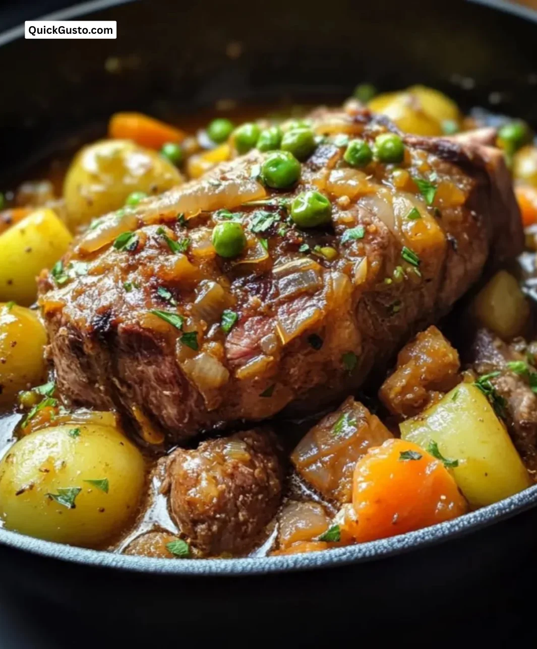 Delicious slow oven-braised lamb with spring vegetables served on a plate.
