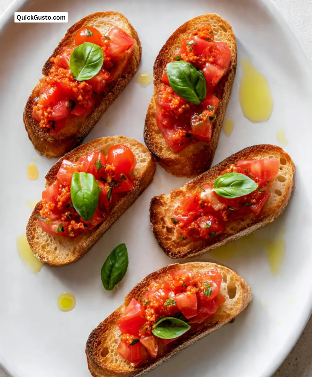 Tomato Bruschetta topped with Nduja, a flavorful Italian appetizer.