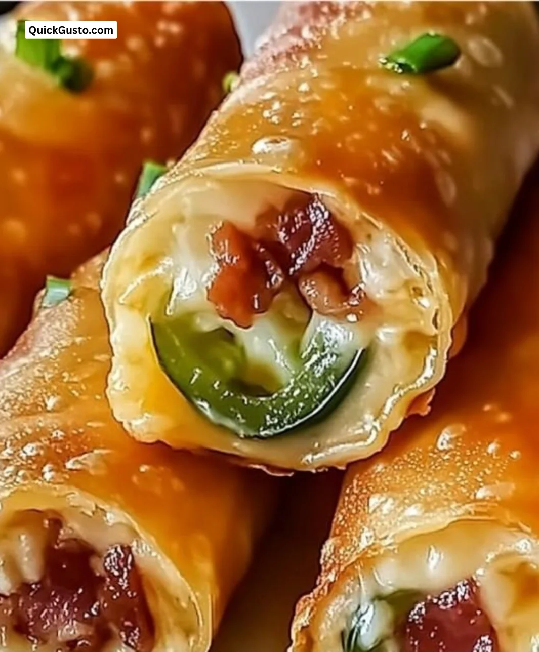 Delicious Bacon Jalapeño Popper Eggrolls served on a platter