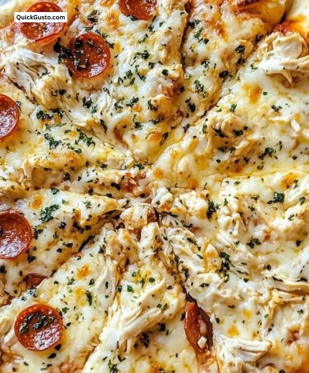 Canned chicken pizza crust prepared with toppings on a wooden board