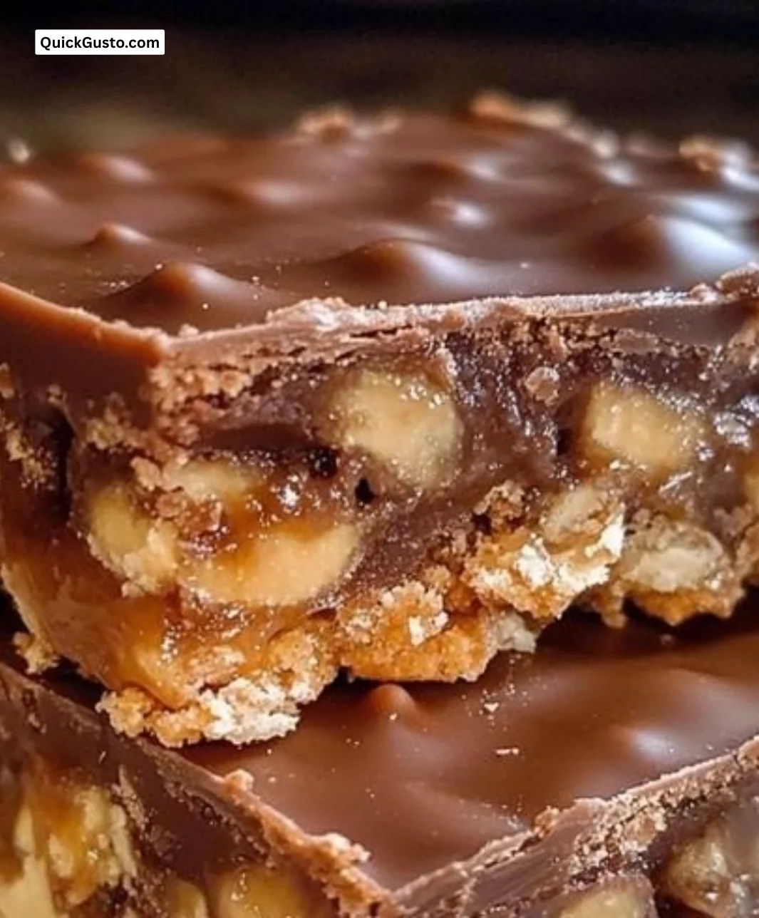 Delicious homemade Caramel Chocolate Crunch Bars on a dessert plate.