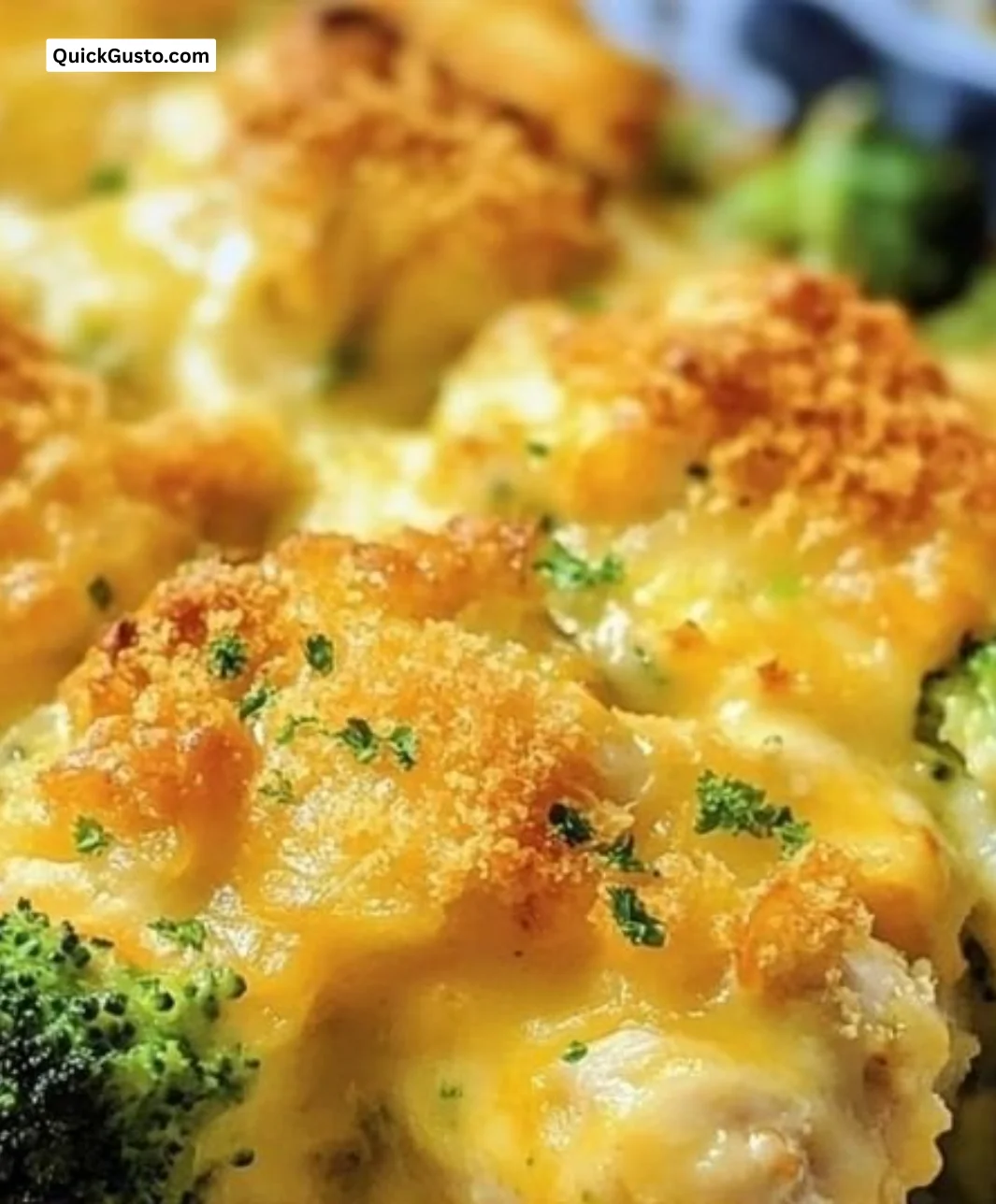 Cheesy baked chicken with broccoli served on a plate