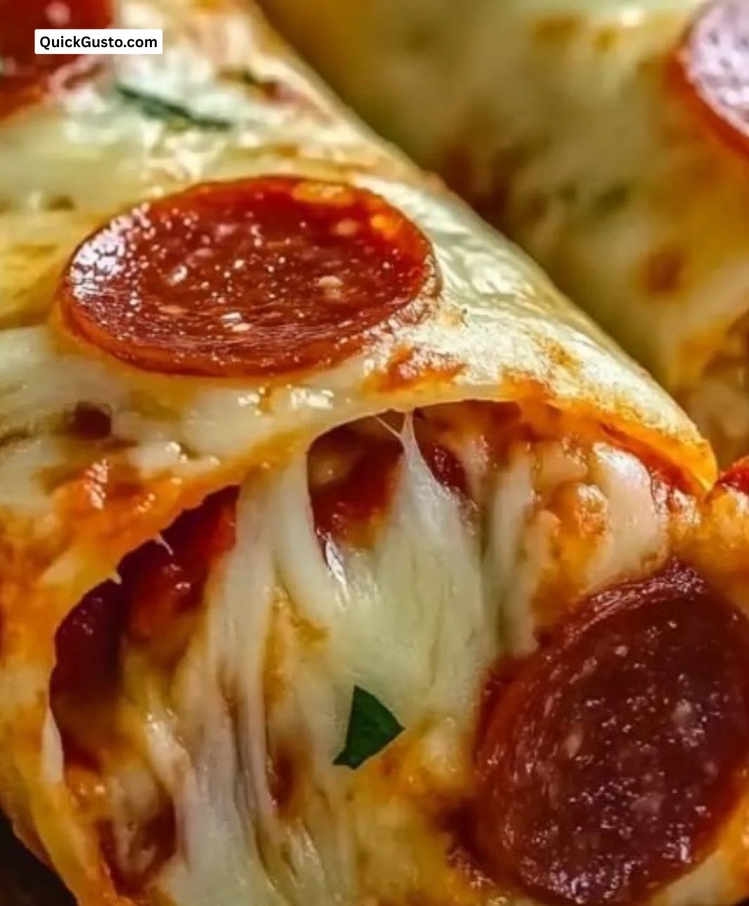 Cheesy pepperoni pizza roll-ups fresh out of the oven