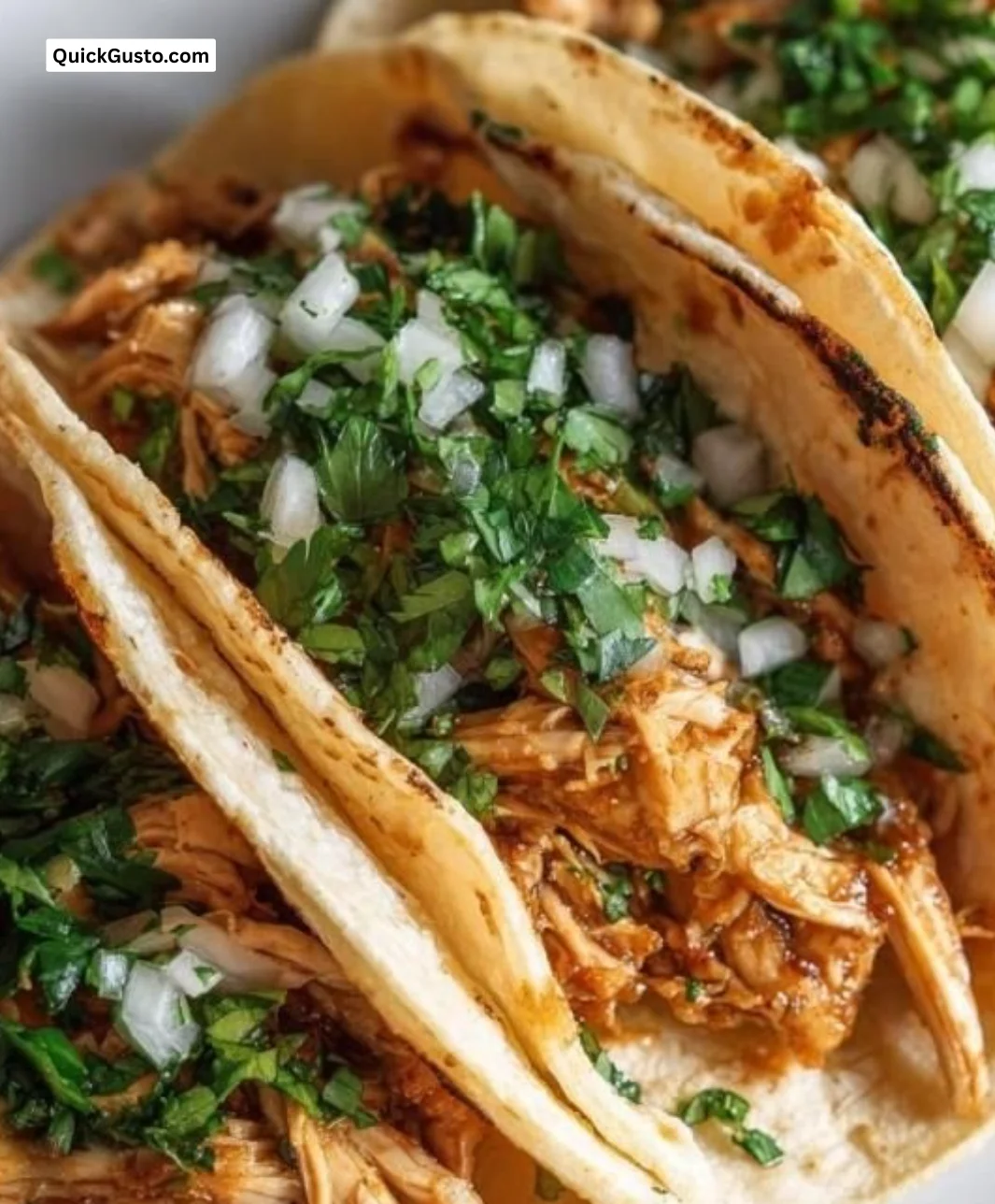 Delicious Chicken Tacos served with fresh toppings and garnishes