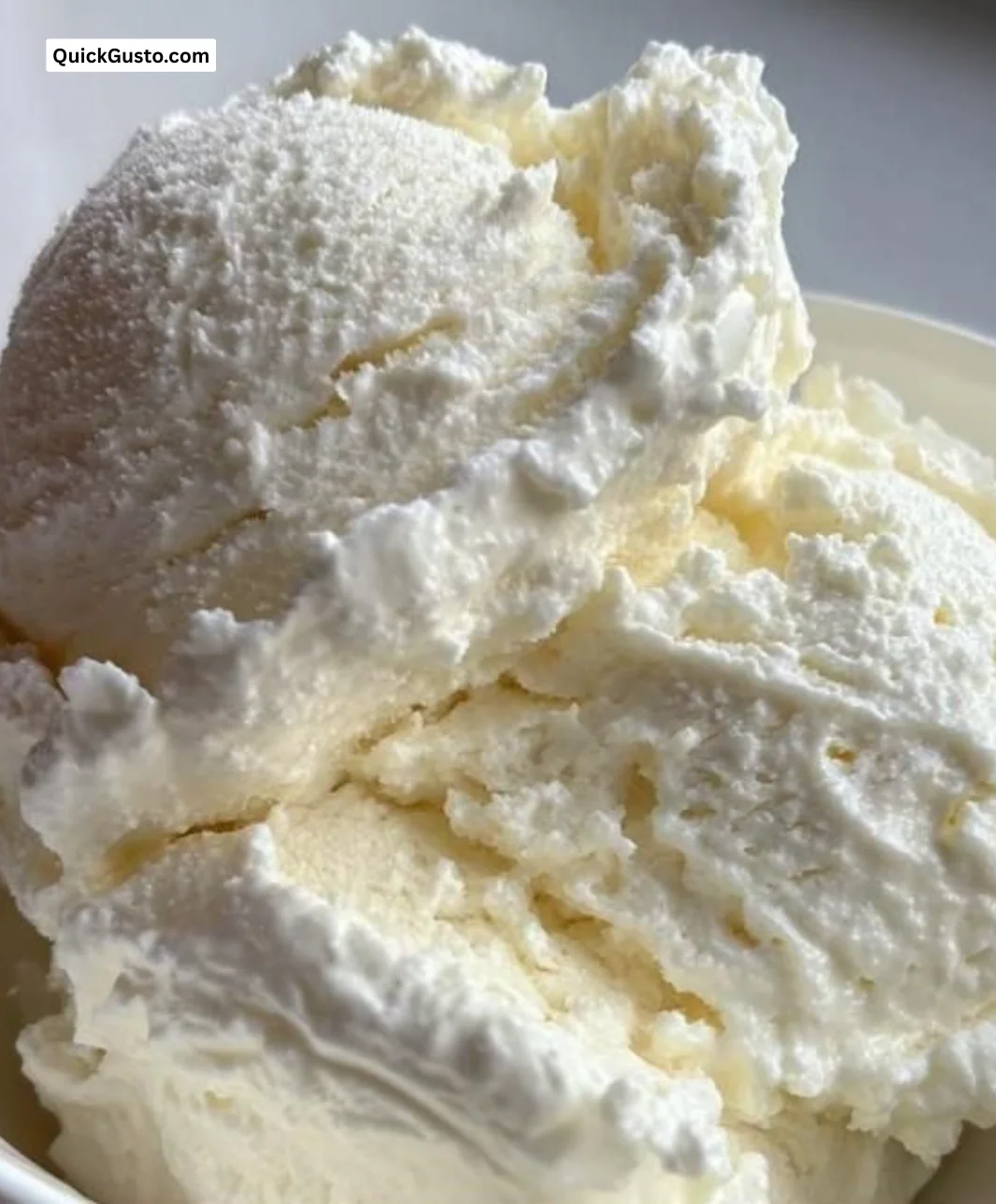 Bowl of cottage cheese ice cream topped with fresh fruits