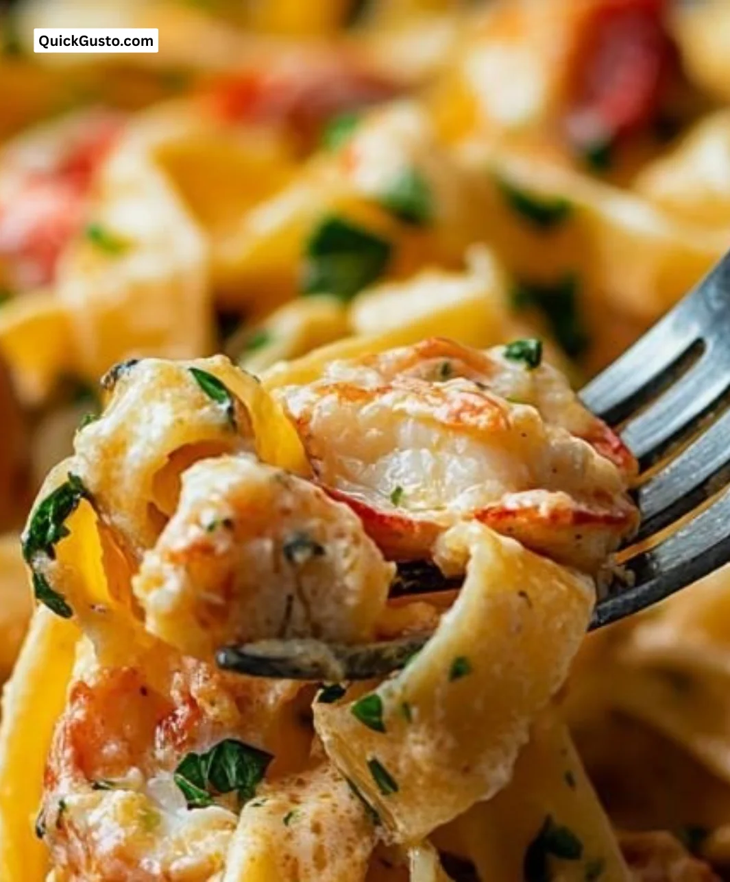 Delicious plate of crawfish fettuccine garnished with herbs.