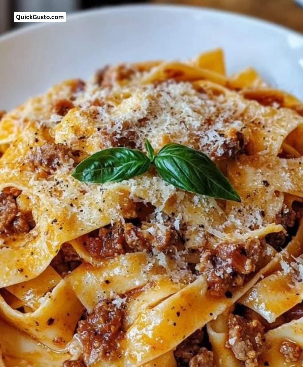 Creamy Calabrian Chili Pappardelle dish with sausage and fennel served in a bowl