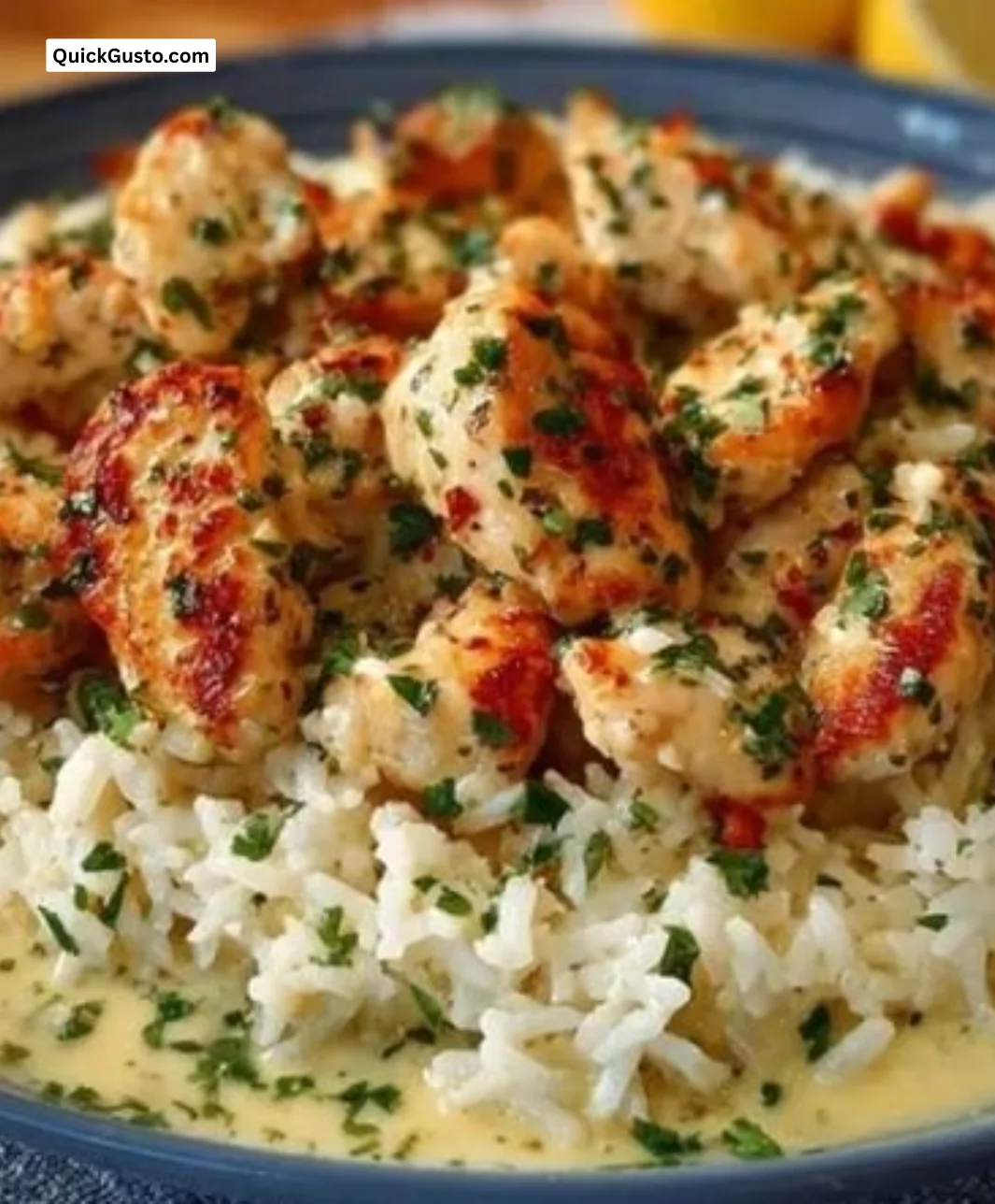 Creamy garlic parmesan chicken scampi rice bowl served in a vibrant dish.