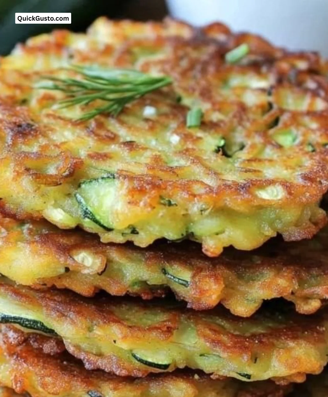 Delicious crispy zucchini fritters served for a healthy lunch.