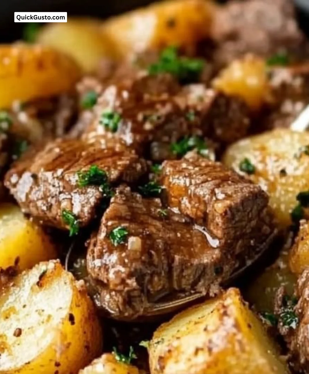 Crockpot Loaded Steak and Potato Bake served in a bowl